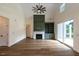 Spacious living room with hardwood floors, fireplace, and open layout at 20 Tamaran Ct, Spring Hope, NC 27882