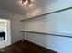 Spacious walk-in closet with hardwood floors and built-in shelving at 20 Tamaran Ct, Spring Hope, NC 27882