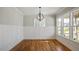 Elegant dining room with hardwood floors, modern lighting, and ample natural light at 224 Wash Hollow Dr, Wendell, NC 27591