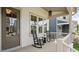 Inviting front porch with rocking chairs, great for relaxing and enjoying the neighborhood at 224 Wash Hollow Dr, Wendell, NC 27591