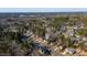 Scenic aerial view of a well-maintained neighborhood with tree-lined streets and established landscaping at 2773 Clifton Avenue, Creedmoor, NC 27522