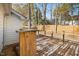Spacious back deck with wooden railings, overlooking a fenced yard at 2773 Clifton Avenue, Creedmoor, NC 27522