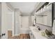 Bathroom features a bathtub, shower, and updated vanity at 2773 Clifton Avenue, Creedmoor, NC 27522