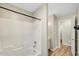 Simple bathroom with a shower/tub and access to another room at 2773 Clifton Avenue, Creedmoor, NC 27522