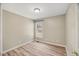 Bright and airy bedroom with light walls and wood-look flooring at 2773 Clifton Avenue, Creedmoor, NC 27522