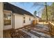 Wooden deck showcasing backyard views and house exterior at 2773 Clifton Avenue, Creedmoor, NC 27522
