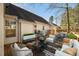 Deck with seating area and partial view of house exterior at 2773 Clifton Avenue, Creedmoor, NC 27522