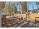 Wooden deck with backyard access and wooden privacy fence at 2773 Clifton Avenue, Creedmoor, NC 27522