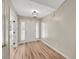 Bright entryway with hardwood floors and neutral wall colors at 2773 Clifton Avenue, Creedmoor, NC 27522