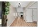 Light and airy entryway with hardwood floors and a view into the living room at 2773 Clifton Avenue, Creedmoor, NC 27522