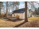 White house exterior with a deck and screened porch at 2773 Clifton Avenue, Creedmoor, NC 27522
