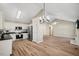 Modern kitchen with stainless steel appliances and white cabinets at 2773 Clifton Avenue, Creedmoor, NC 27522