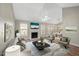 Living room features hardwood floors, fireplace, and access to the backyard at 2773 Clifton Avenue, Creedmoor, NC 27522