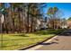 Aerial view of home and street, showcasing landscape at 3 Acornridge Ct, Durham, NC 27707