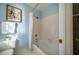 Bathroom with shower/tub combo and hexagon floor tile at 3 Acornridge Ct, Durham, NC 27707