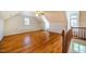 Large bonus room with hardwood floors and window at 3 Acornridge Ct, Durham, NC 27707