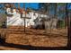 Back of house, showcasing deck and screened porch at 3 Acornridge Ct, Durham, NC 27707