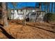 View of house from the wooded backyard at 3 Acornridge Ct, Durham, NC 27707