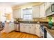 Modern kitchen with granite countertops and stainless steel appliances at 3 Acornridge Ct, Durham, NC 27707
