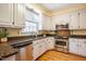 Well-equipped kitchen with stainless steel appliances and granite countertops at 3 Acornridge Ct, Durham, NC 27707