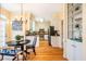 Kitchen features white cabinets, granite counters, and stainless steel appliances at 3 Acornridge Ct, Durham, NC 27707