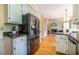 Open kitchen with stainless steel appliances and granite countertops at 3 Acornridge Ct, Durham, NC 27707