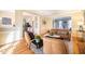 Spacious living room with hardwood floors and views into kitchen and dining area at 3 Acornridge Ct, Durham, NC 27707
