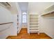Large walk-in closet with ample shelving at 3 Acornridge Ct, Durham, NC 27707