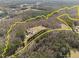 Aerial view of the property showing the home, pool, additional structure and approximate property lines at 413 Johnson Town Rd, Zebulon, NC 27597