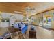 Kitchenette with white cabinets, and a view of the pool at 413 Johnson Town Rd, Zebulon, NC 27597