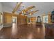 Spacious main bedroom with hardwood floors and log walls at 413 Johnson Town Rd, Zebulon, NC 27597