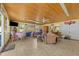 Cozy recreation room features wicker furniture and tiled floors at 413 Johnson Town Rd, Zebulon, NC 27597