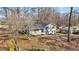 Ranch home with a spacious yard and wooded surroundings at 420 W 10Th St, Siler City, NC 27344