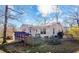 View of the deck and backyard, showing the house's exterior at 420 W 10Th St, Siler City, NC 27344