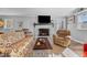 Finished basement with fireplace and seating area at 420 W 10Th St, Siler City, NC 27344