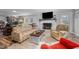 Finished basement with a fireplace and comfortable seating at 420 W 10Th St, Siler City, NC 27344