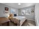 Cozy bedroom with a double bed and two windows at 420 W 10Th St, Siler City, NC 27344