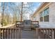 Spacious deck with wooden railings and outdoor seating at 420 W 10Th St, Siler City, NC 27344