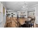 Open concept dining room with rustic farmhouse table and kitchen views at 420 W 10Th St, Siler City, NC 27344