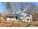 Charming ranch home with gray siding, brick accents, and a spacious front yard at 420 W 10Th St, Siler City, NC 27344