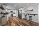 Modern kitchen with white cabinets, granite countertops, and stainless steel appliances at 420 W 10Th St, Siler City, NC 27344
