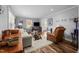 Cozy living room featuring hardwood floors, comfy seating, and large windows at 420 W 10Th St, Siler City, NC 27344