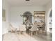 Bright dining room with a built-in wine rack and herringbone floors at 432 Firefly Overlook, Pittsboro, NC 27312