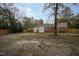 Exterior view of a home and backyard featuring a new fence at 601 Rose St, Rocky Mount, NC 27801