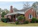 Brick house with a porch, showcasing its side elevation at 601 Rose St, Rocky Mount, NC 27801