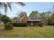 Brick house with a porch and well-manicured lawn at 601 Rose St, Rocky Mount, NC 27801
