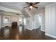 Spacious living area with fireplace, ceiling fans, and hardwood flooring at 601 Rose St, Rocky Mount, NC 27801