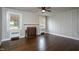 Cozy living room has fireplace, wood floors, and natural lighting at 601 Rose St, Rocky Mount, NC 27801