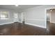 Hardwood floor living room, access to other rooms at 601 Rose St, Rocky Mount, NC 27801