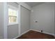 Mud room featuring a window and painted grey at 601 Rose St, Rocky Mount, NC 27801